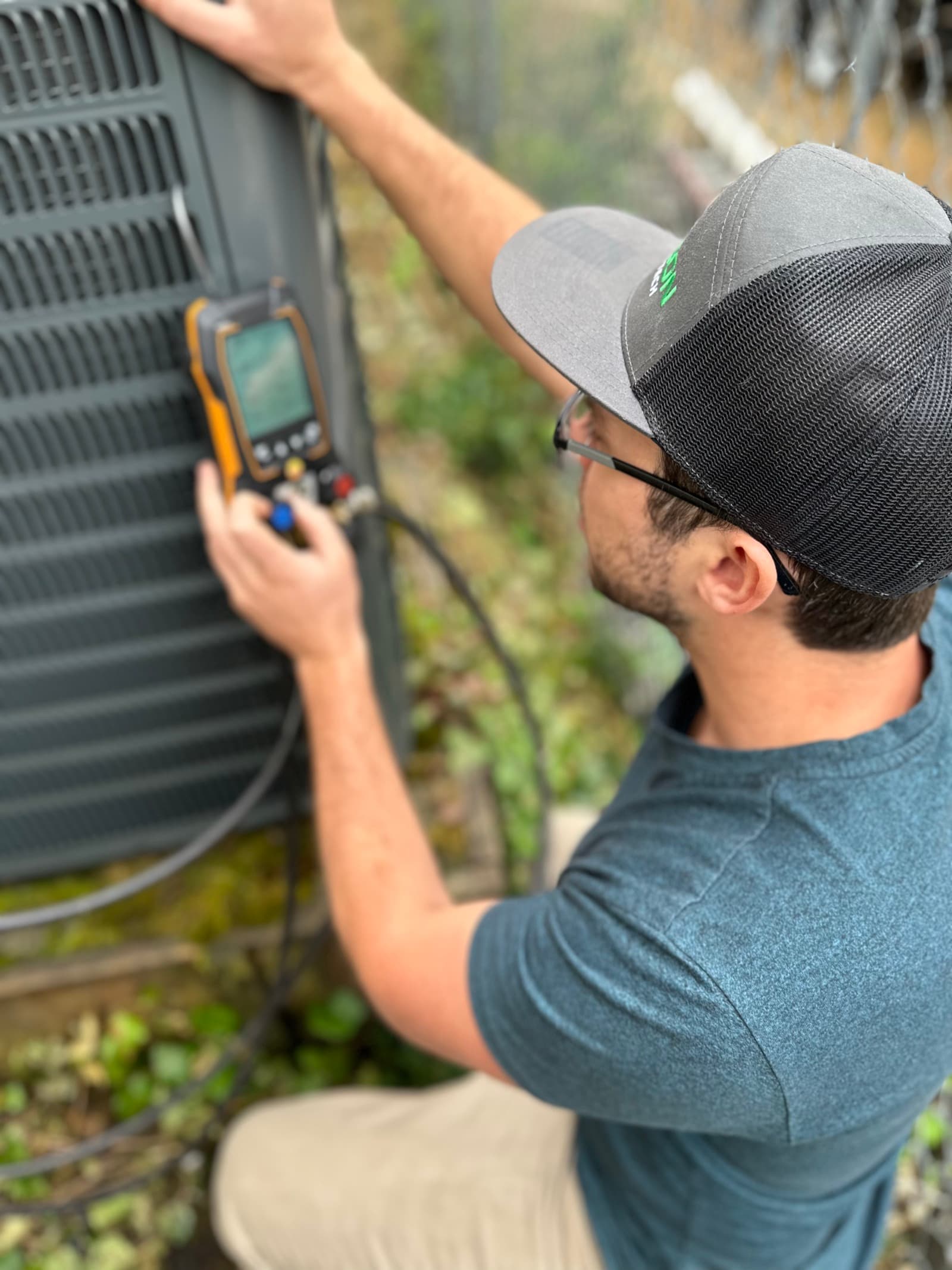 Adam Eells of Oregon Climate Tech on an AC repair call in Milwaukie, OR.